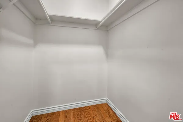 a view of small space with racks on the wall