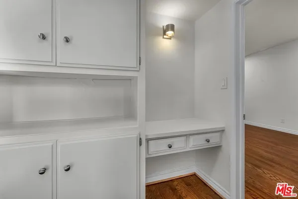 a view of an empty walk in closet