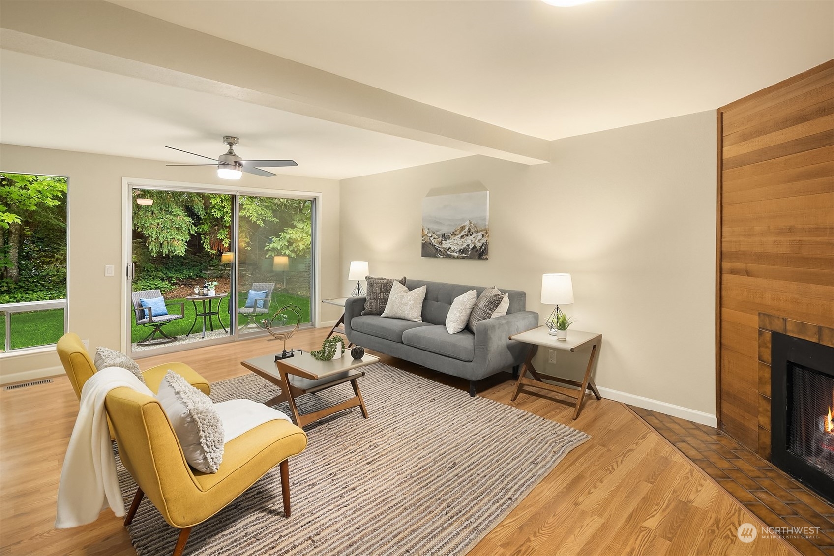 16617 24th Drive Southeast Bothell, WA 98012 - Photo 14 of 29 a living room with furniture and a fireplace