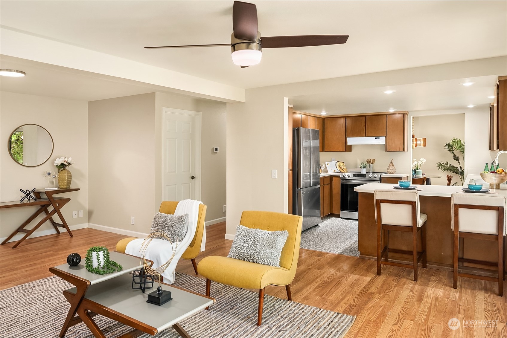 16617 24th Drive Southeast Bothell, WA 98012 - Photo 15 of 29 a living room with furniture and kitchen view