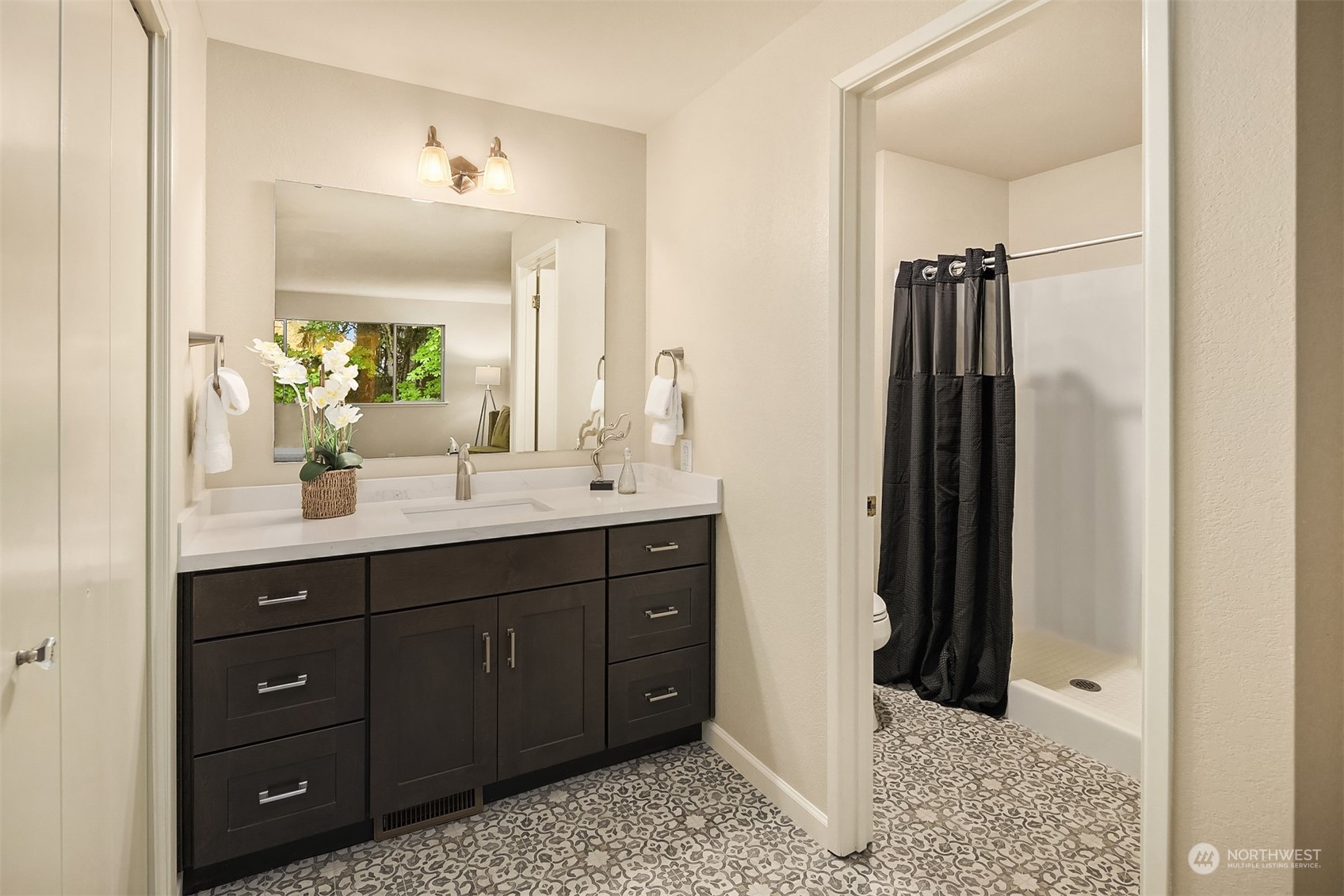 16617 24th Drive Southeast Bothell, WA 98012 - Photo 20 of 29 a bathroom with a sink and a mirror