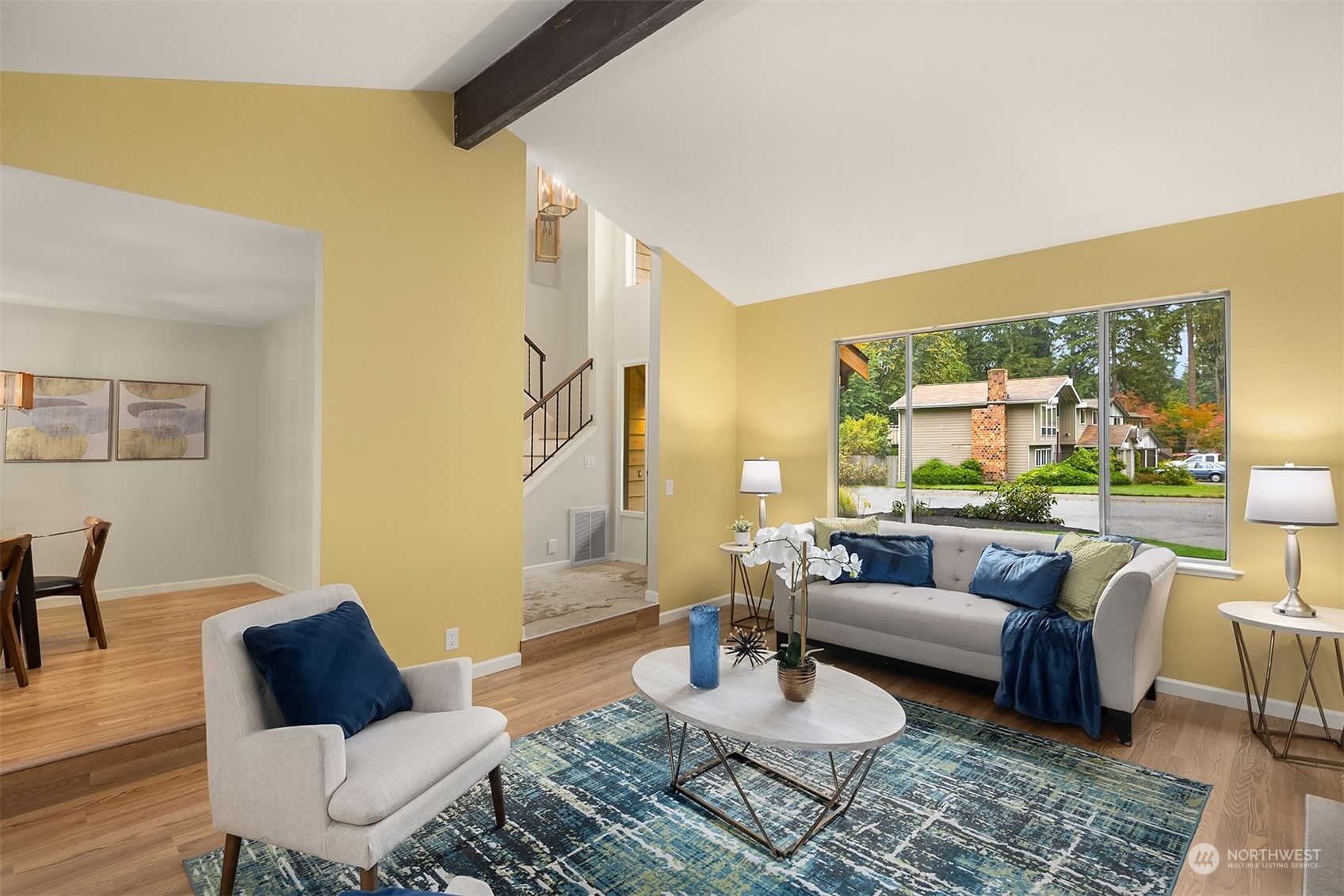 16617 24th Drive Southeast Bothell, WA 98012 - Photo 2 of 29 a living room with furniture and a large window
