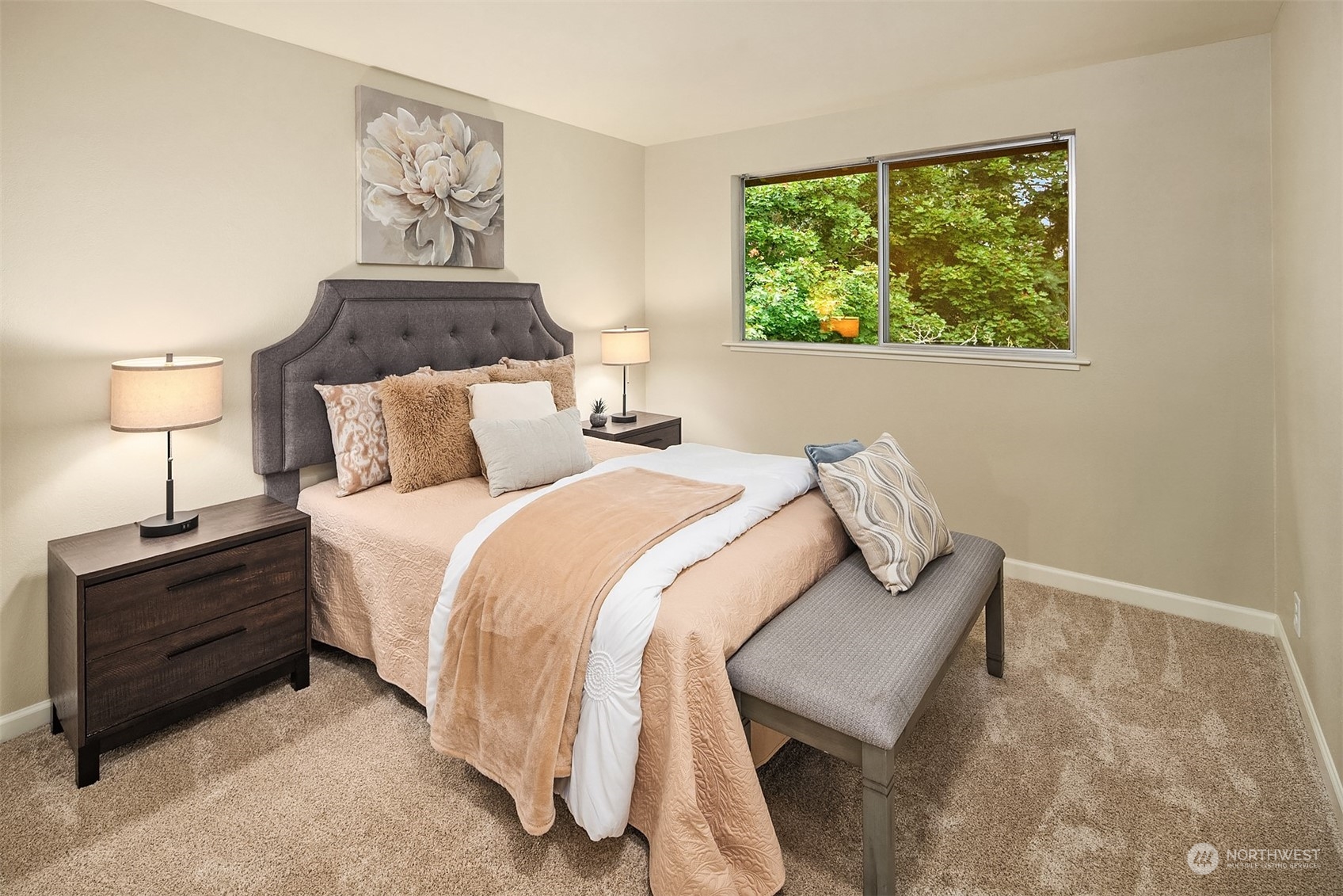16617 24th Drive Southeast Bothell, WA 98012 - Photo 22 of 29 a bedroom with a bed and a painting on the wall