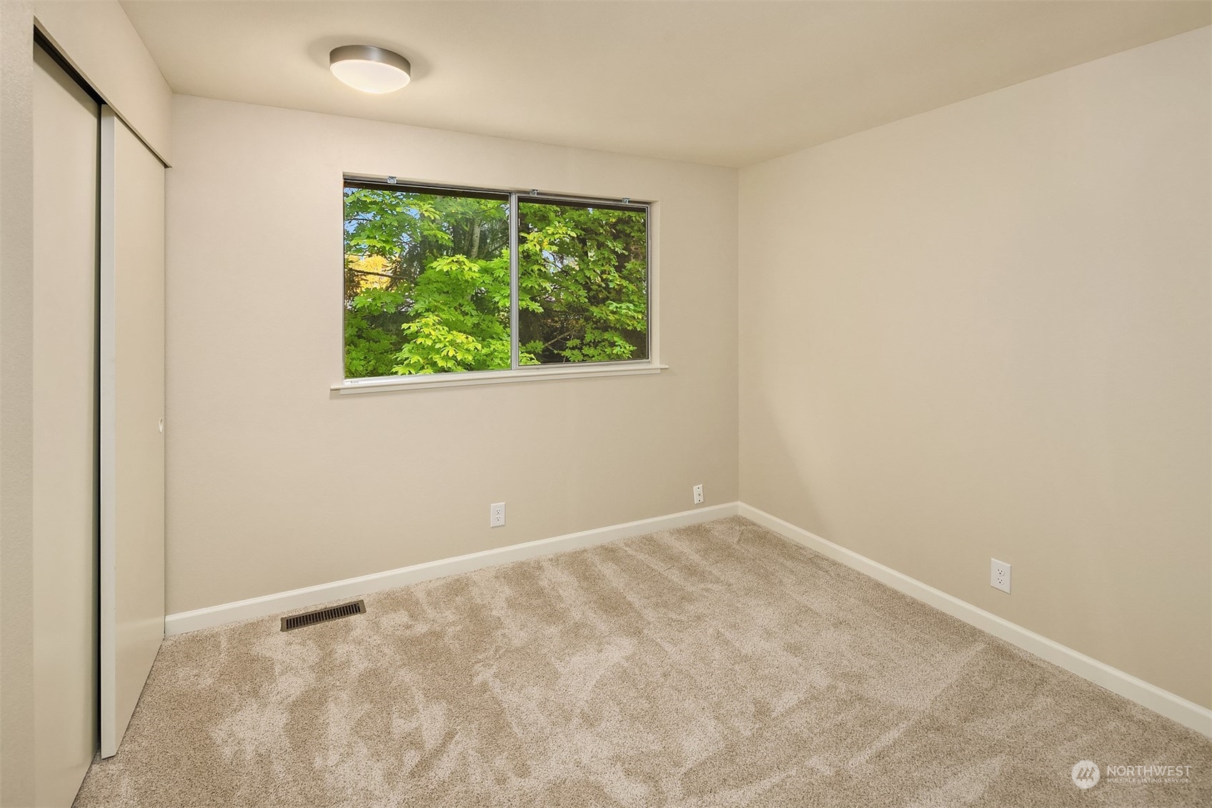 16617 24th Drive Southeast Bothell, WA 98012 - Photo 23 of 29 an empty room with a window