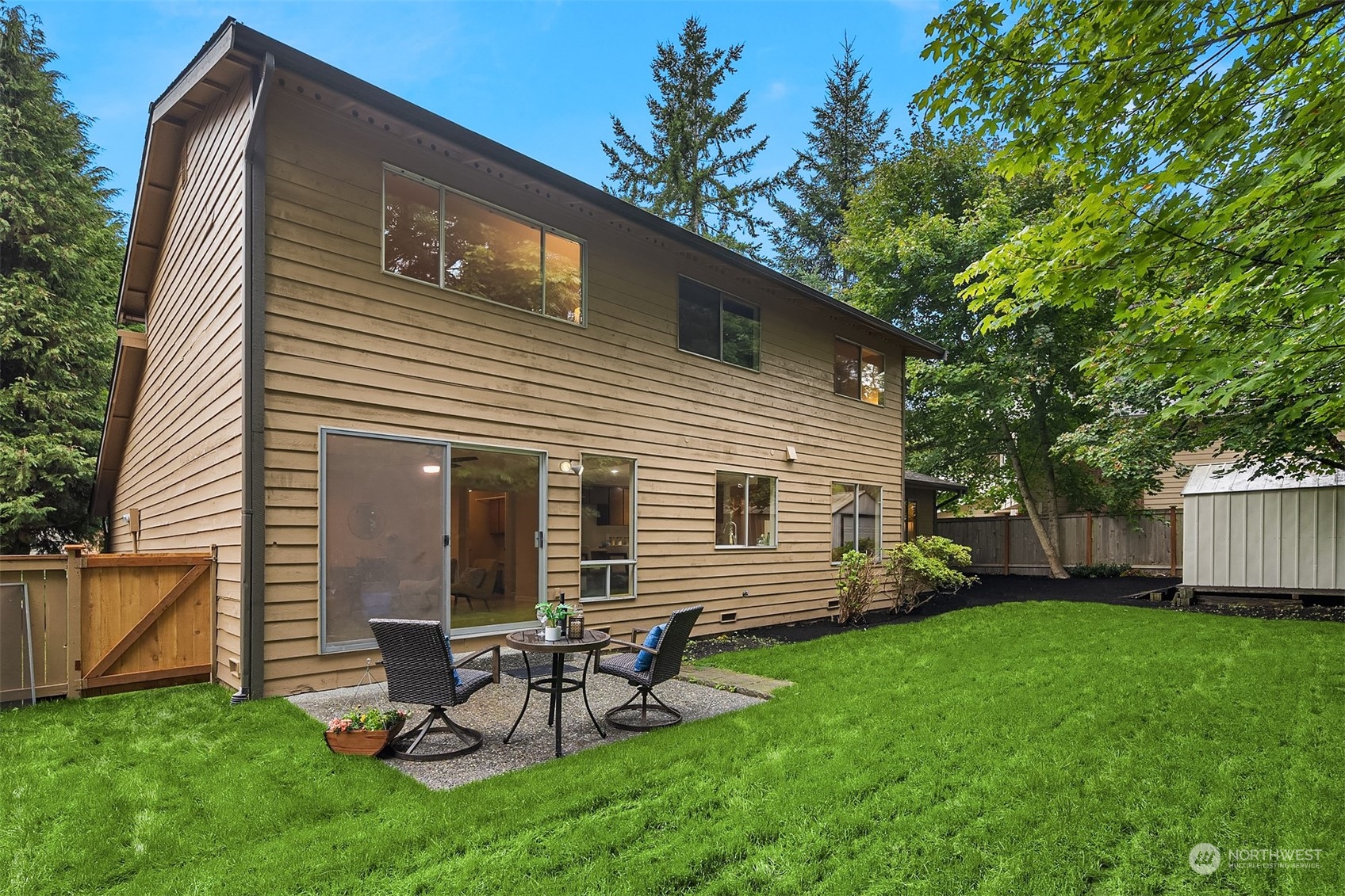 16617 24th Drive Southeast Bothell, WA 98012 - Photo 25 of 29 a backyard of a house with table and chairs