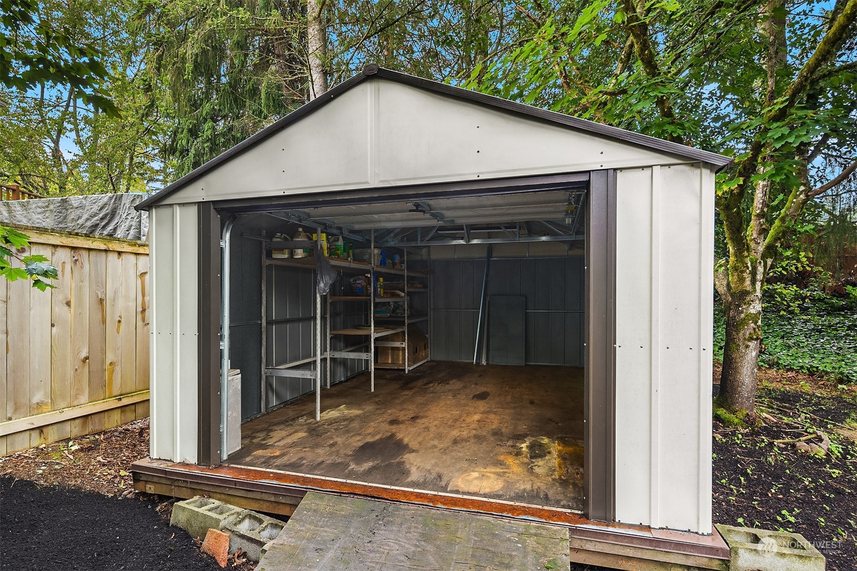 16617 24th Drive Southeast Bothell, WA 98012 - Photo 27 of 29 a view of a house with a door and wooden walls