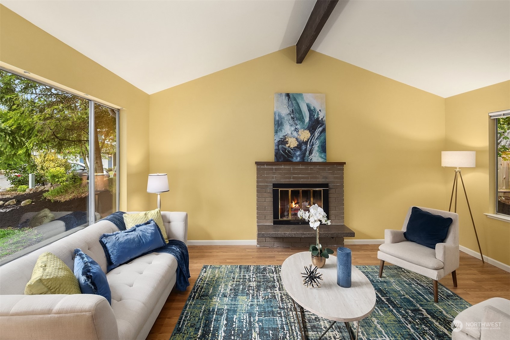 16617 24th Drive Southeast Bothell, WA 98012 - Photo 4 of 29 a living room with furniture and a fireplace
