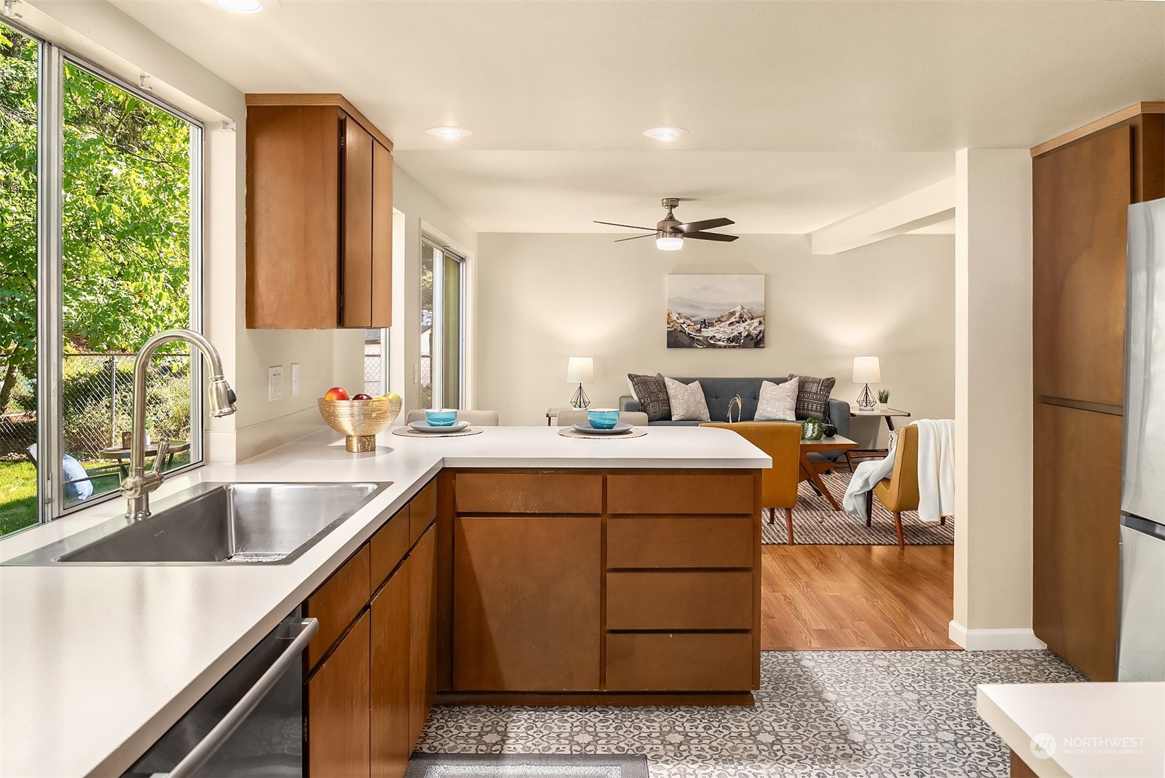 16617 24th Drive Southeast Bothell, WA 98012 - Photo 9 of 29 a view of a kitchen area with furniture and staircase