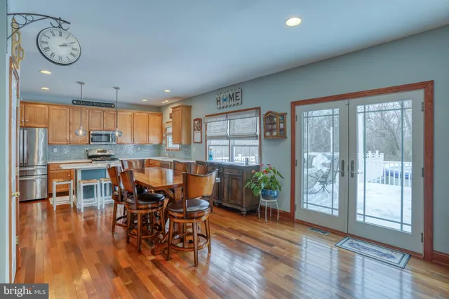 a dining room with furniture window wooden floor