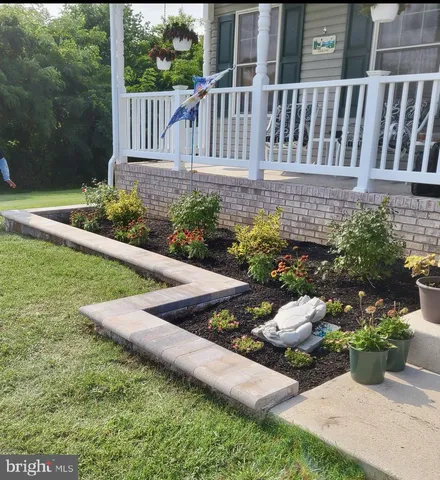 a view of a house with garden