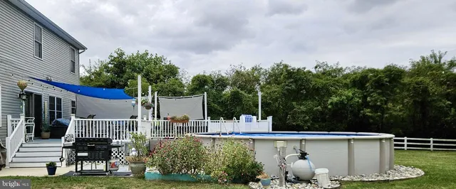a view of a garden with patio