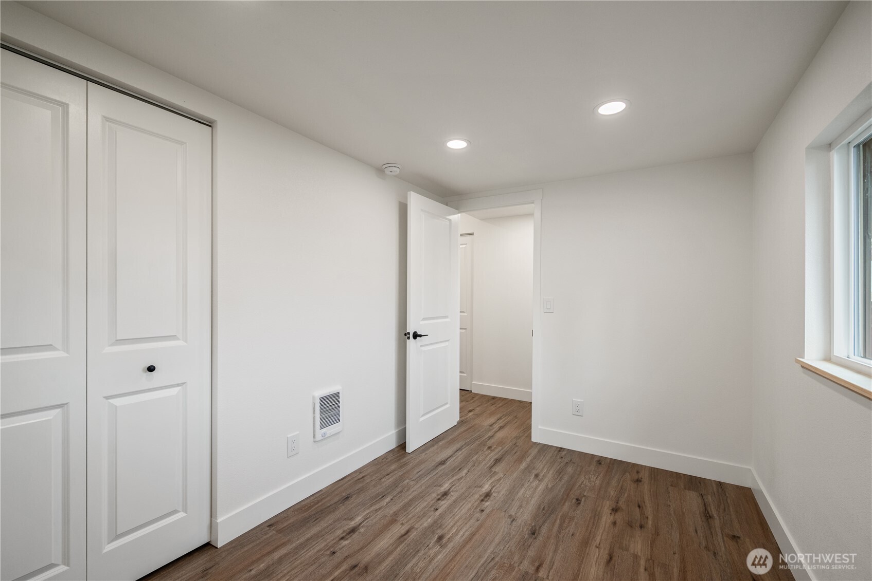 450 16th Avenue Longview, WA 98632 - Photo 11 of 23 a view of hallway with wooden floor