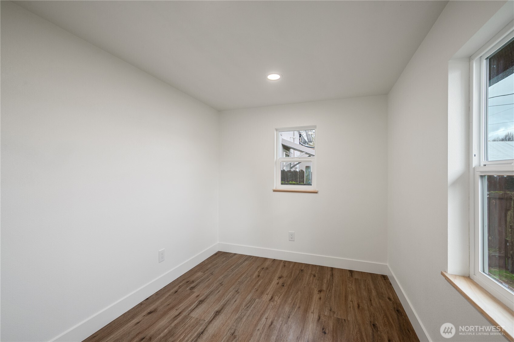 450 16th Avenue Longview, WA 98632 - Photo 13 of 23 wooden floor in an empty room with a window