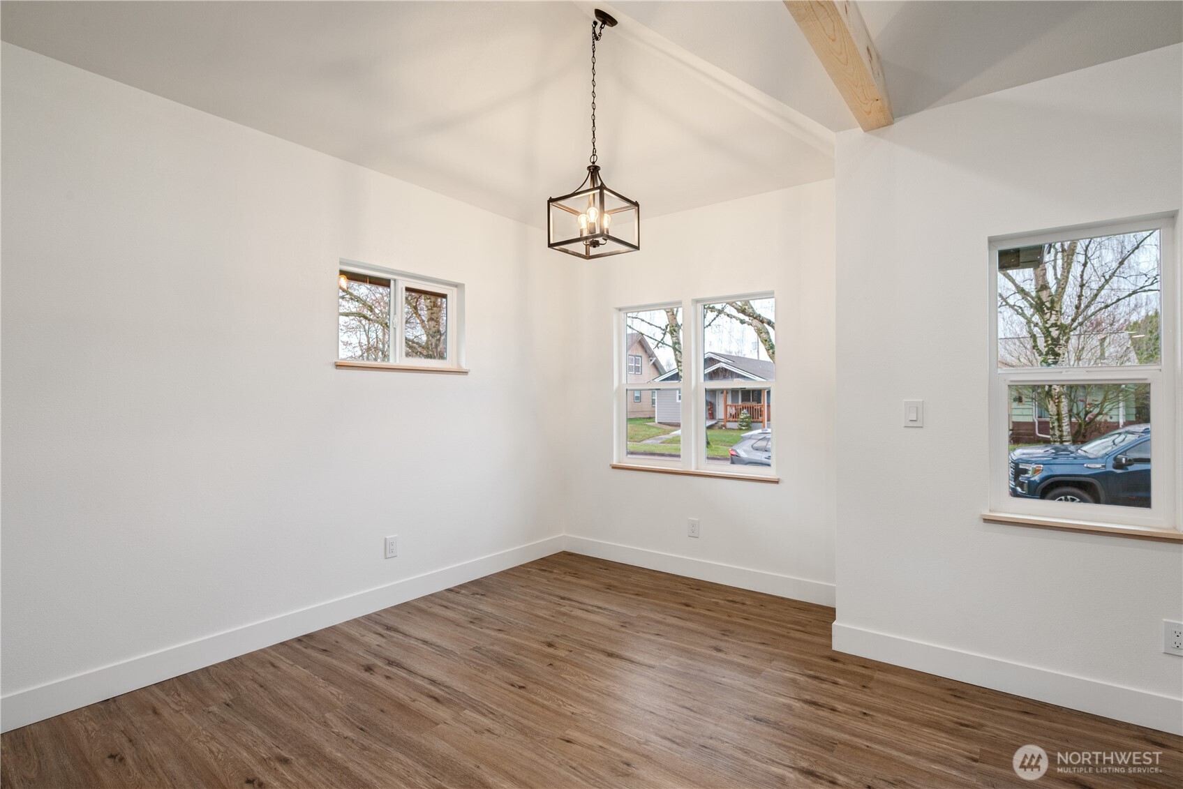 450 16th Avenue Longview, WA 98632 - Photo 7 of 23 a view of empty room with wooden floor and window
