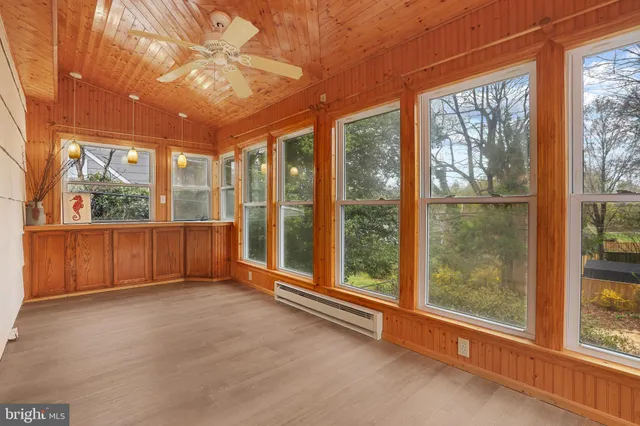 a view of an empty room with a large window