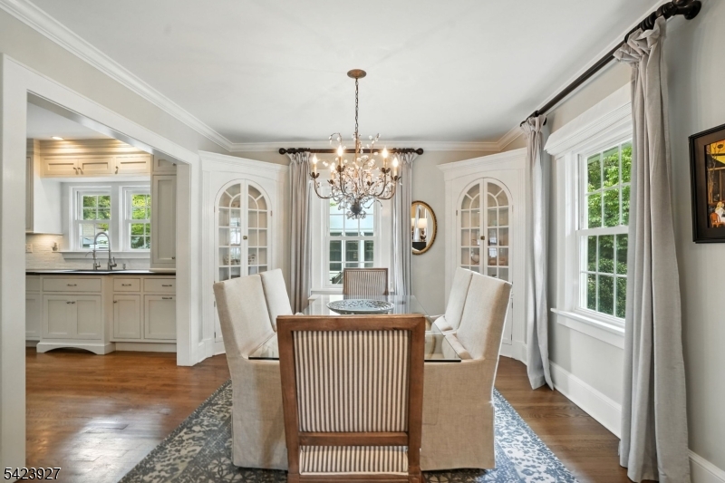 127 Green Village Road Madison, NJ 07940 - Photo 3 of 16 a view of a dining room with furniture window and wooden floor