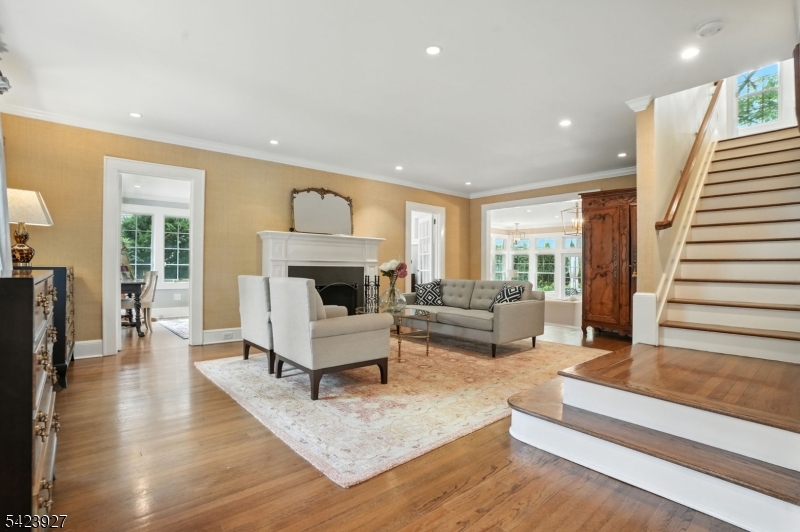 127 Green Village Road Madison, NJ 07940 - Photo 4 of 16 a living room with furniture and a fireplace