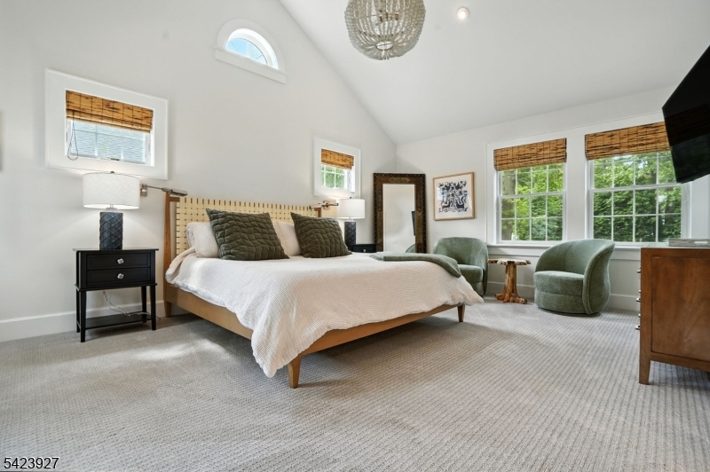 127 Green Village Road Madison, NJ 07940 - Photo 8 of 16 a bedroom with bed and a large window