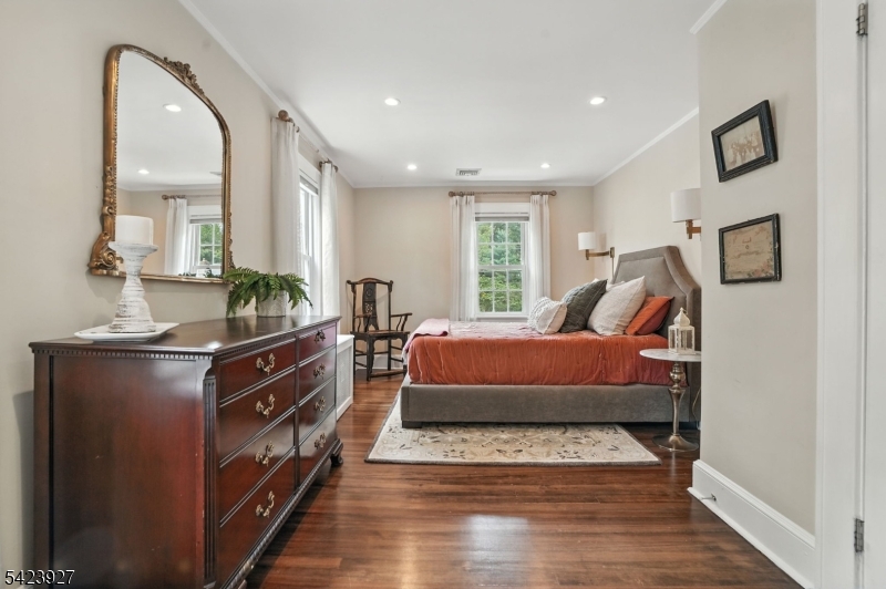 127 Green Village Road Madison, NJ 07940 - Photo 10 of 16 a living room with furniture a rug and white walls