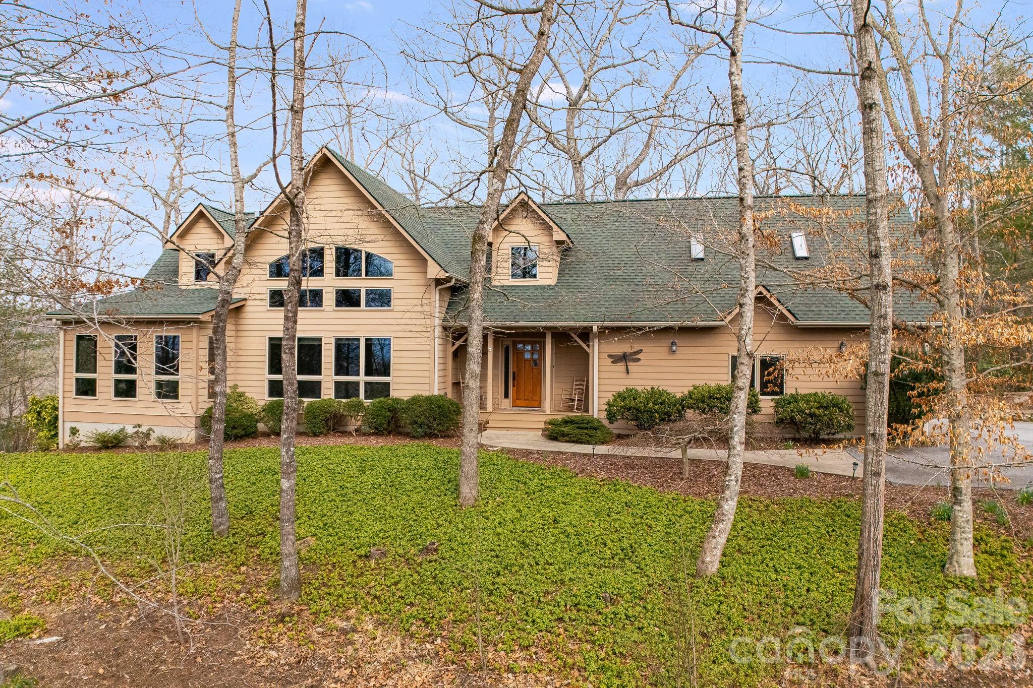5584 Spring Road Hendersonville, NC 28739 - Photo 2 of 45 a front view of a house with a yard
