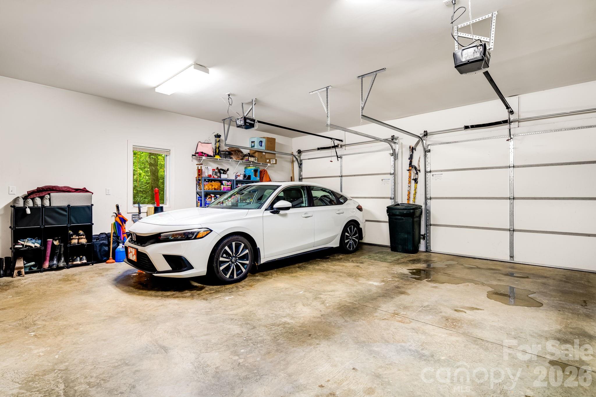 5584 Spring Road Hendersonville, NC 28739 - Photo 38 of 45 a car parked in a garage