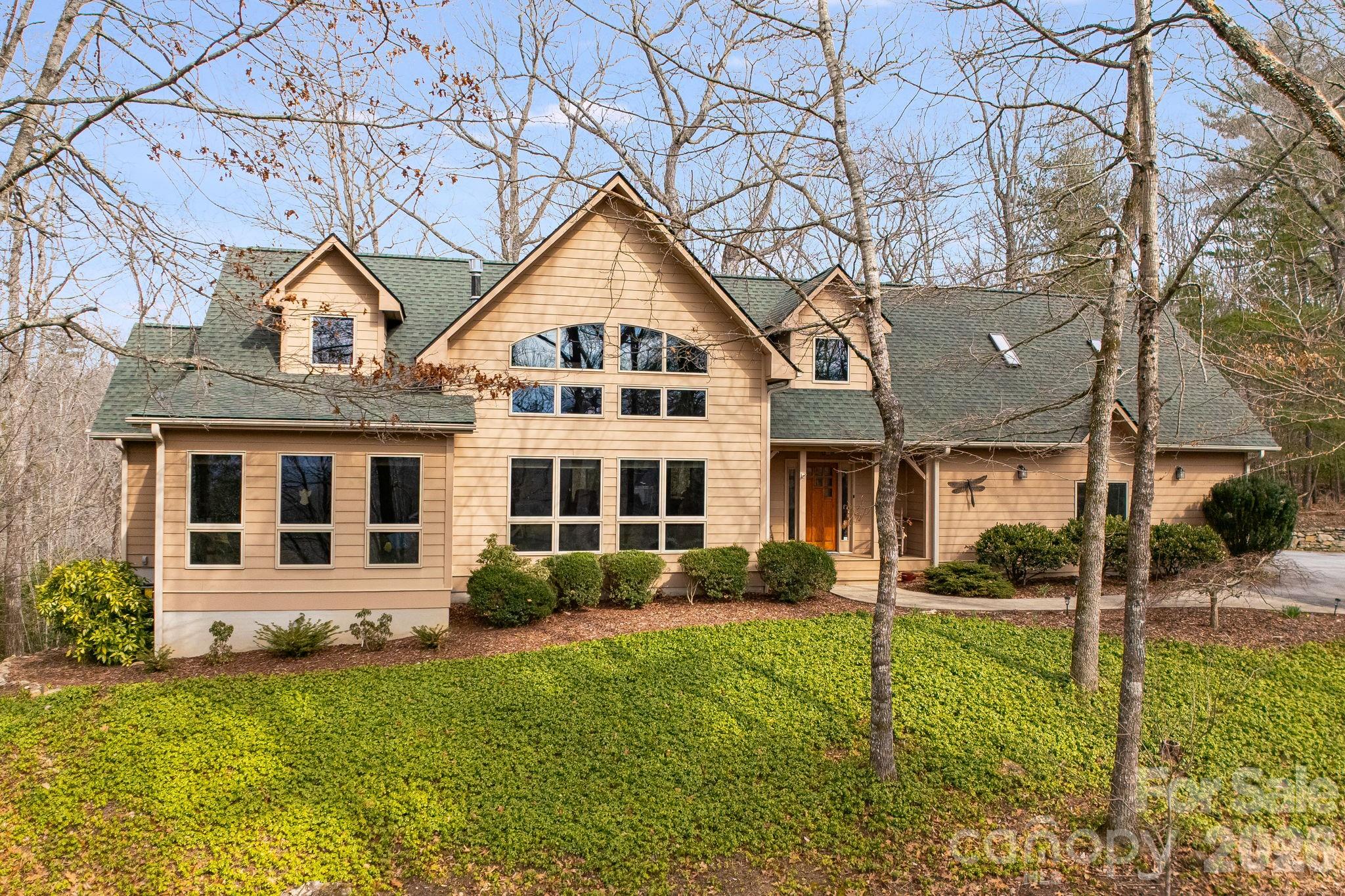 5584 Spring Road Hendersonville, NC 28739 - Photo 42 of 45 front view of a house with a yard