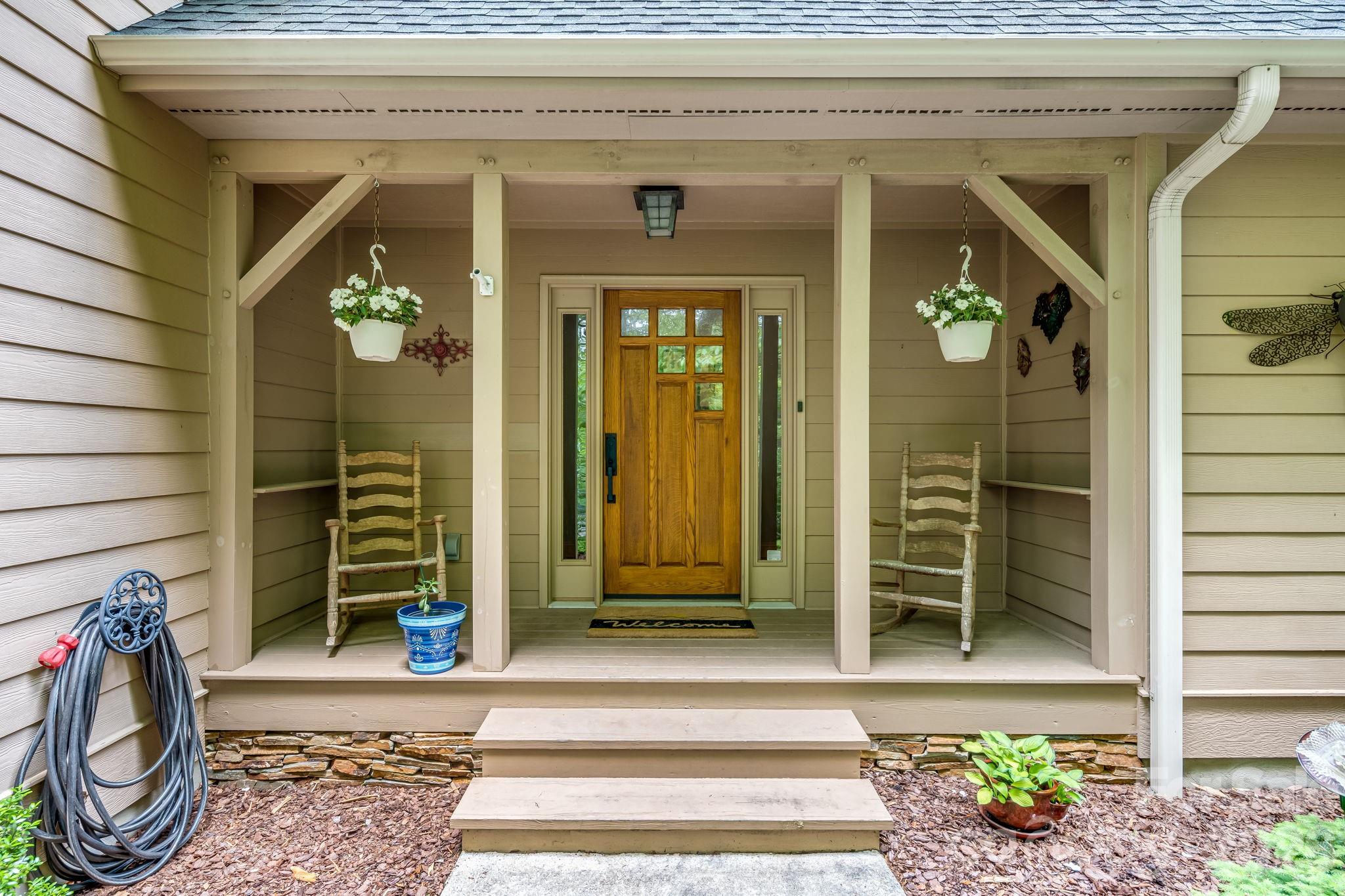 5584 Spring Road Hendersonville, NC 28739 - Photo 6 of 45 a view of a entryway door of the house