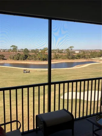 a view of a balcony with an ocean view