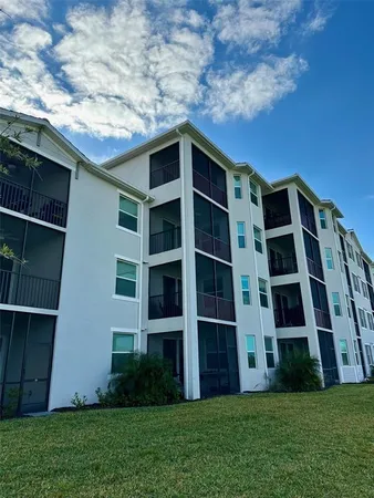 a view of front door of house with yard