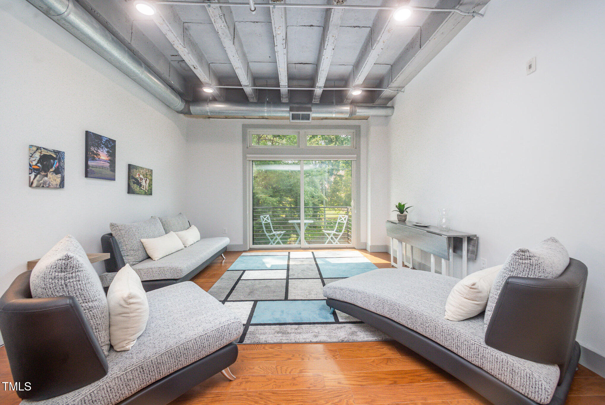 a living room with furniture and a pool