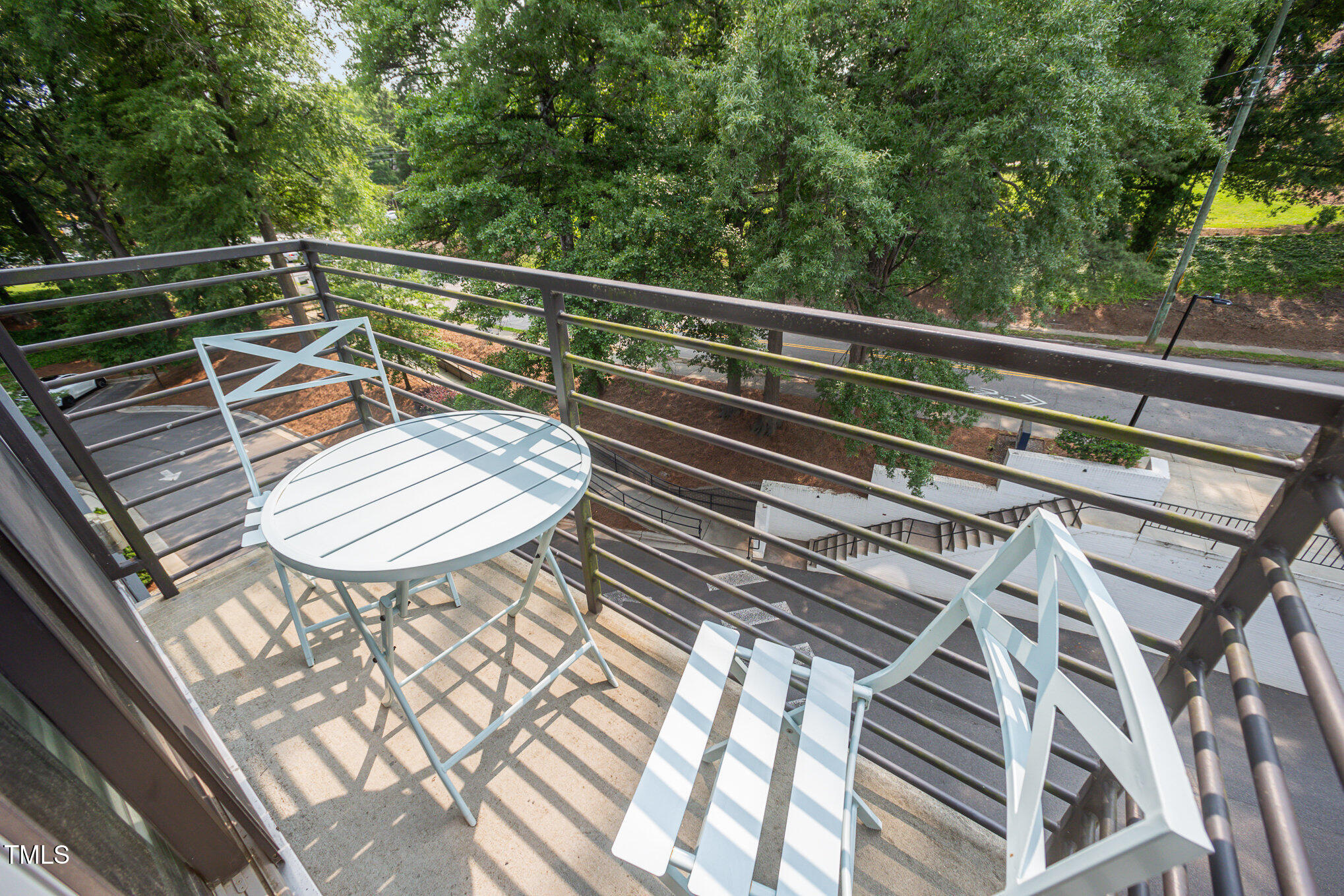 1300 St Marys Street, Unit 408 Raleigh, NC 27605 - Photo 21 of 28 a view of a roof deck with wooden floor and fence