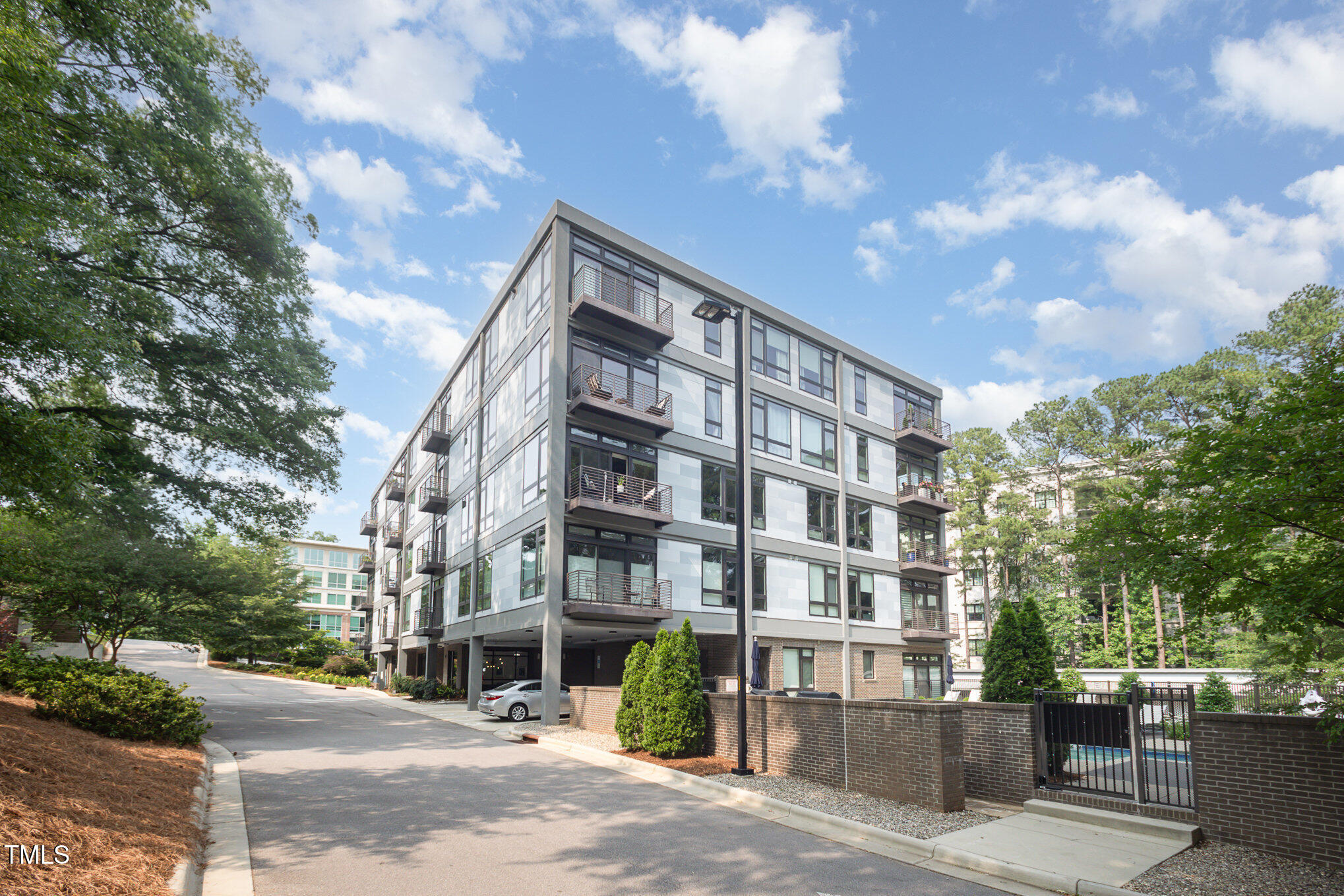 1300 St Marys Street, Unit 408 Raleigh, NC 27605 - Photo 25 of 28 a view of a tall building from a street