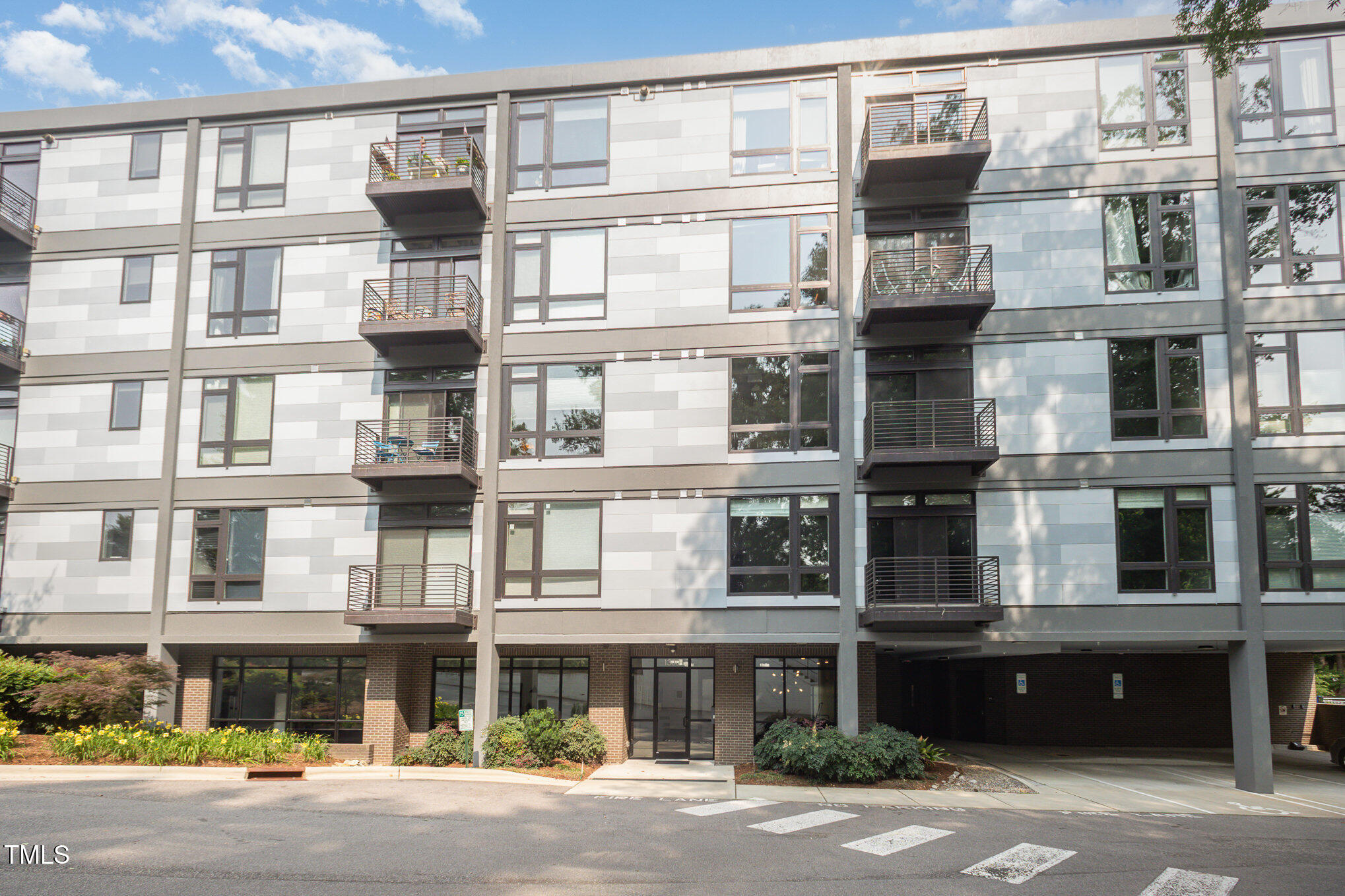 1300 St Marys Street, Unit 408 Raleigh, NC 27605 - Photo 26 of 28 a front view of a building with a street