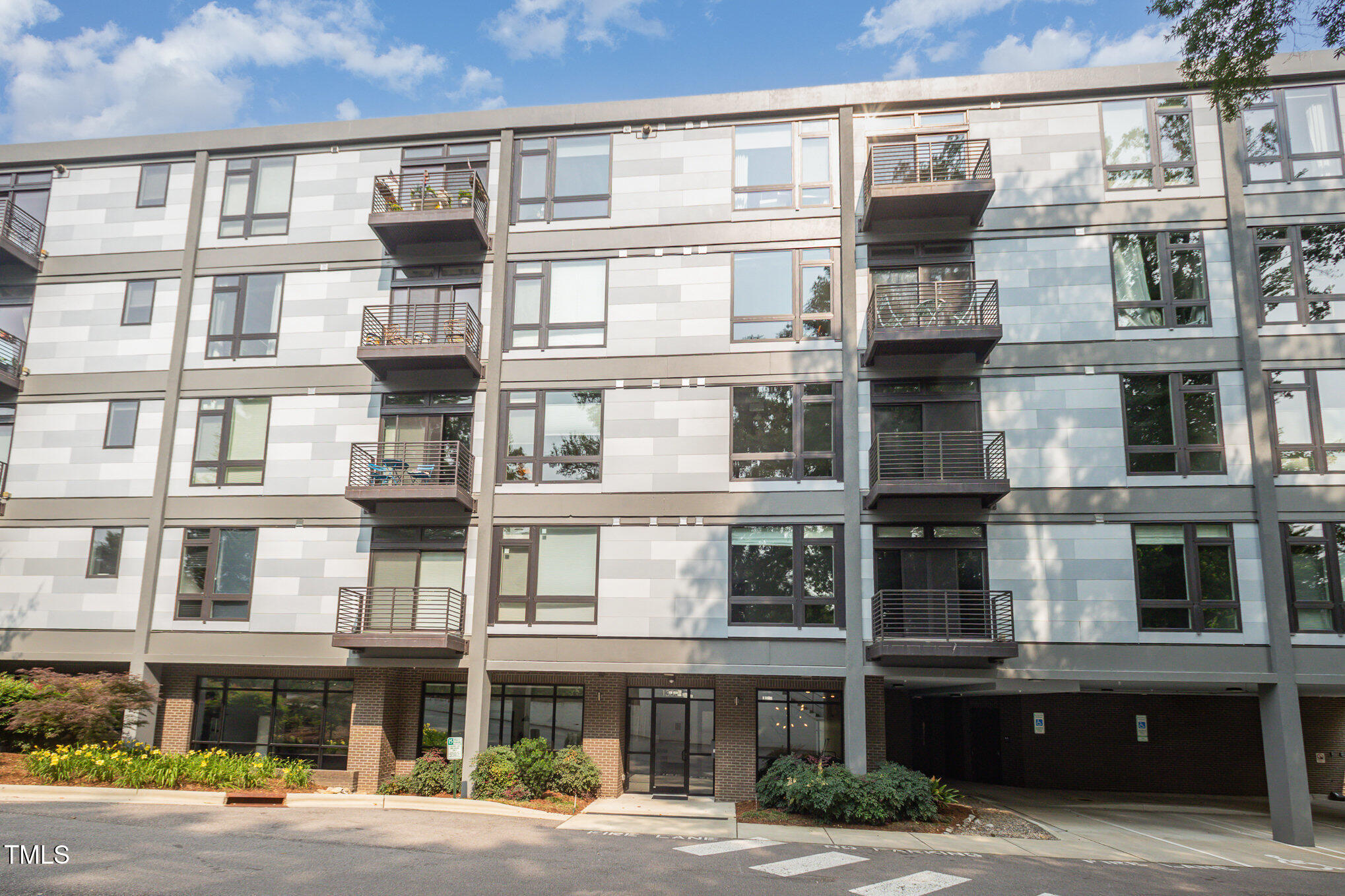 1300 St Marys Street, Unit 408 Raleigh, NC 27605 - Photo 27 of 28 a front view of a building with a street