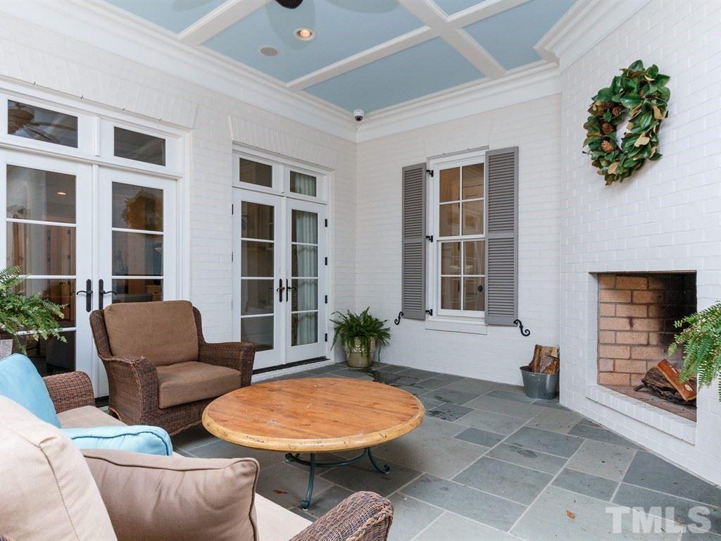 2305 Beechridge Road Raleigh, NC 27608 - Photo 14 of 24 a balcony with furniture and a potted plant
