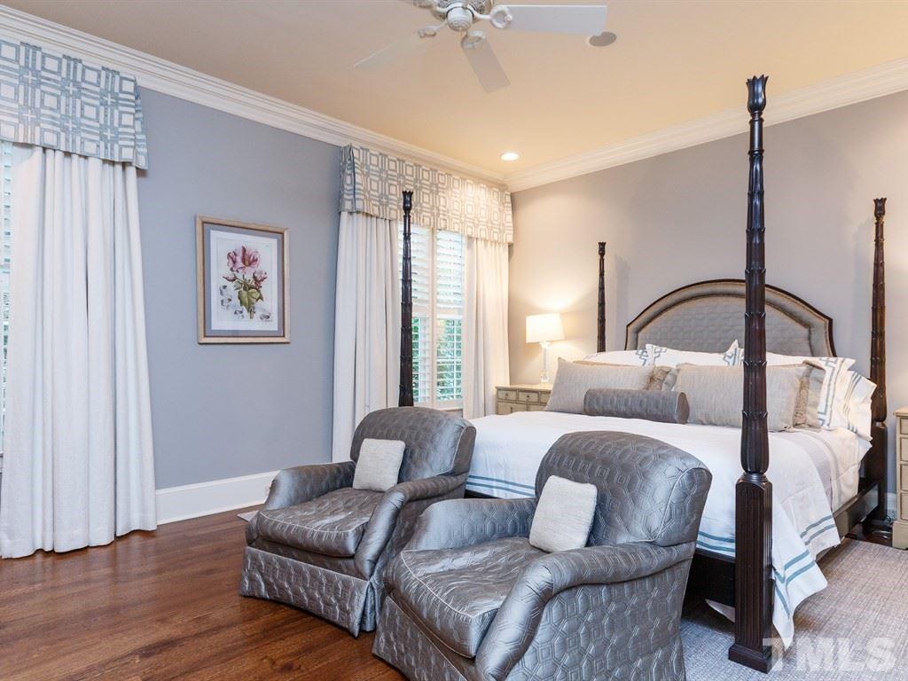 2305 Beechridge Road Raleigh, NC 27608 - Photo 15 of 24 a bedroom with a bed couch and window