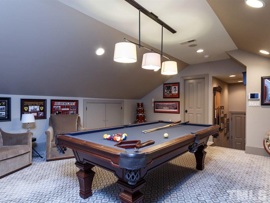 2305 Beechridge Road Raleigh, NC 27608 - Photo 23 of 24 a room with pool table and windows