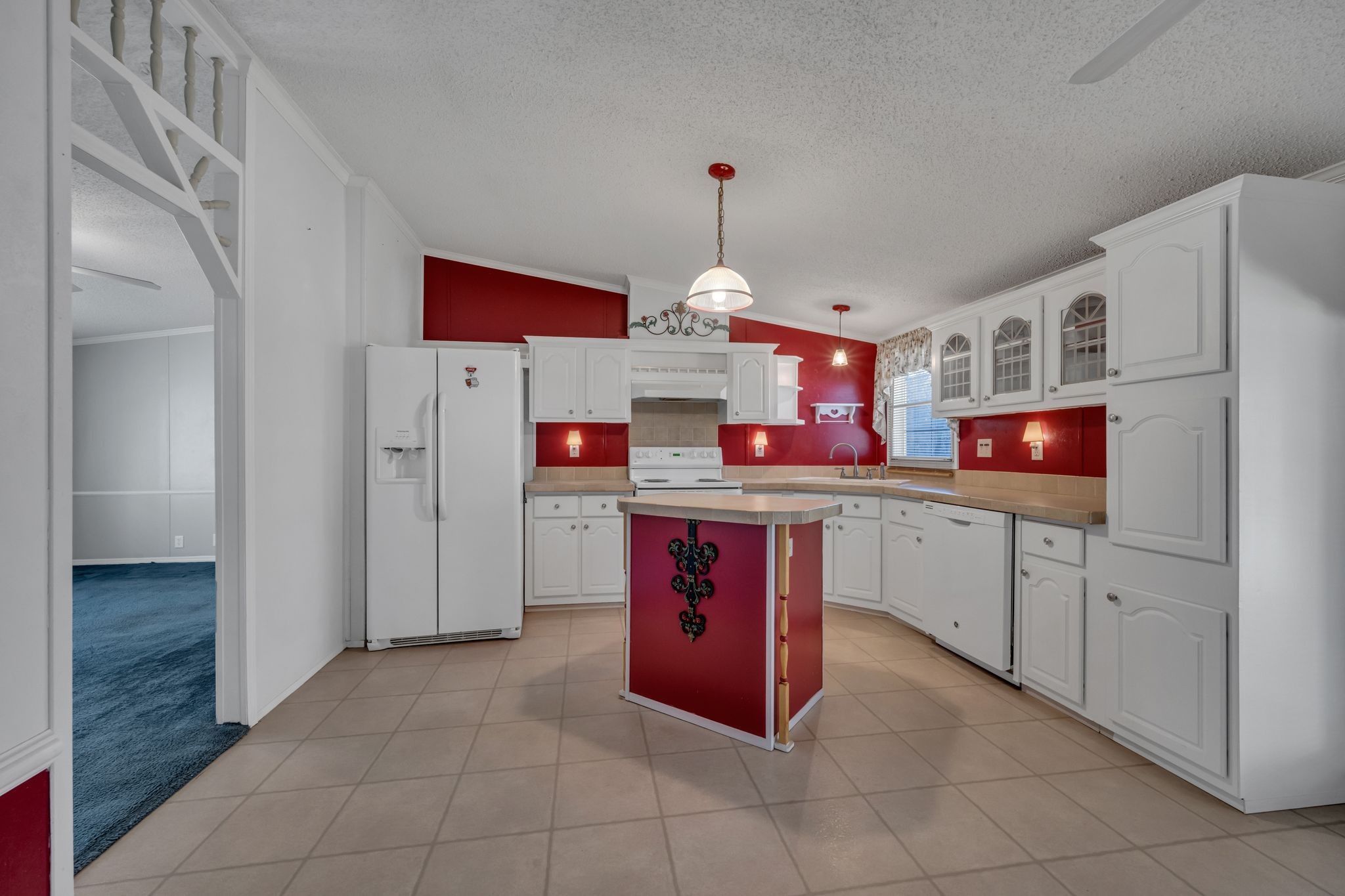 11364 Potts Hollow Road Lyles, TN 37098 - Photo 11 of 29 a kitchen with stainless steel appliances granite countertop a stove and a refrigerator