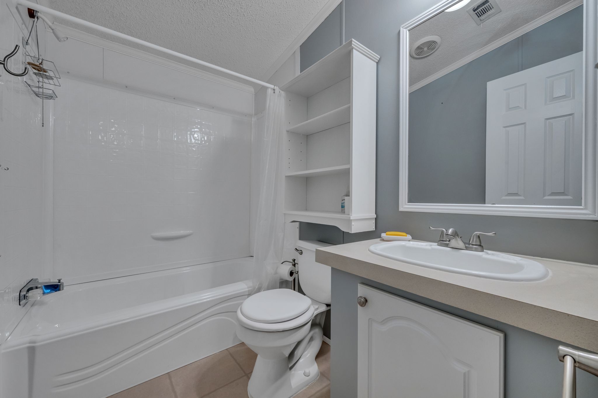 11364 Potts Hollow Road Lyles, TN 37098 - Photo 24 of 29 a bathroom with a sink a toilet and shower