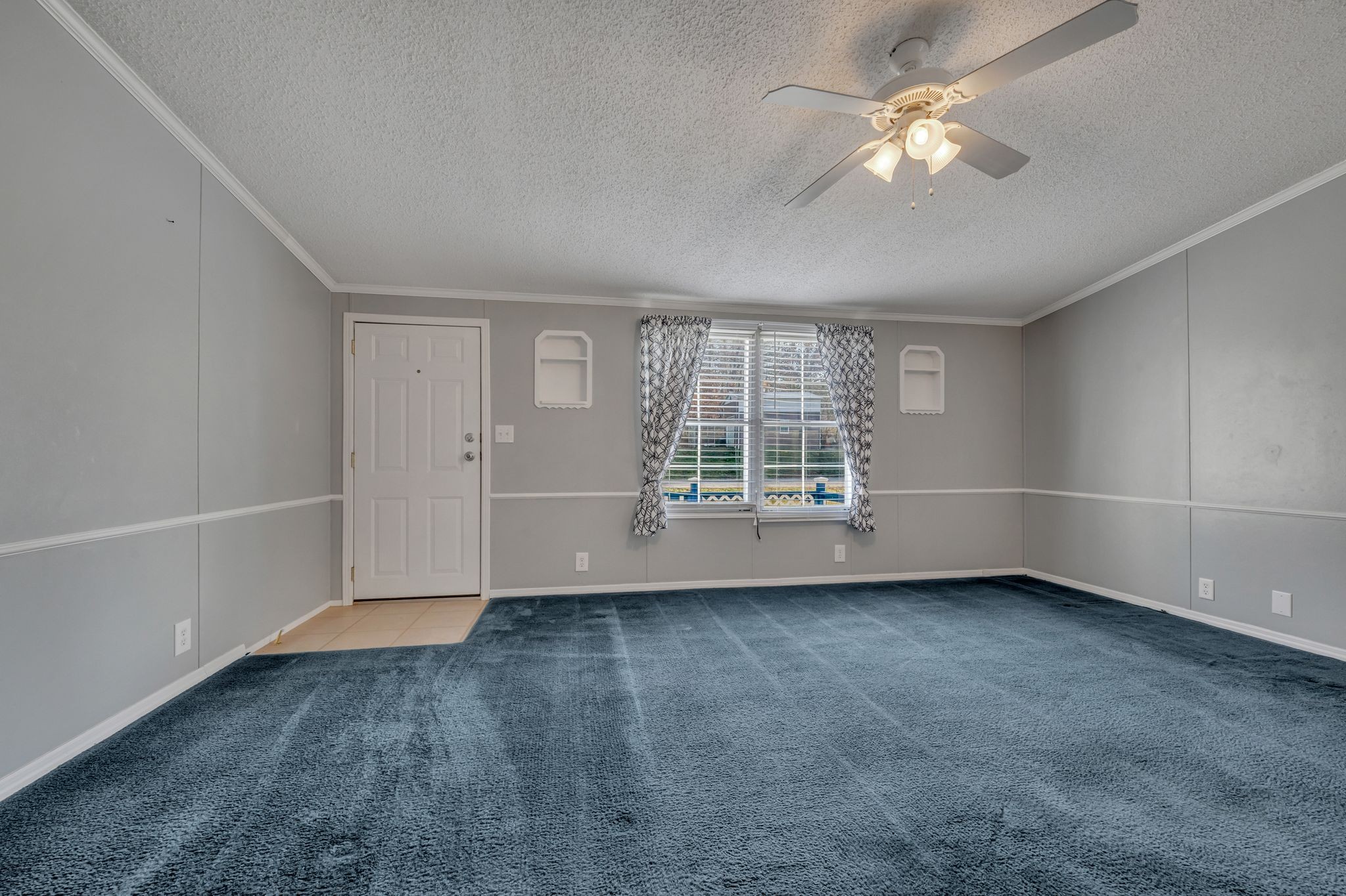 11364 Potts Hollow Road Lyles, TN 37098 - Photo 5 of 29 wooden floor in an empty room with a window