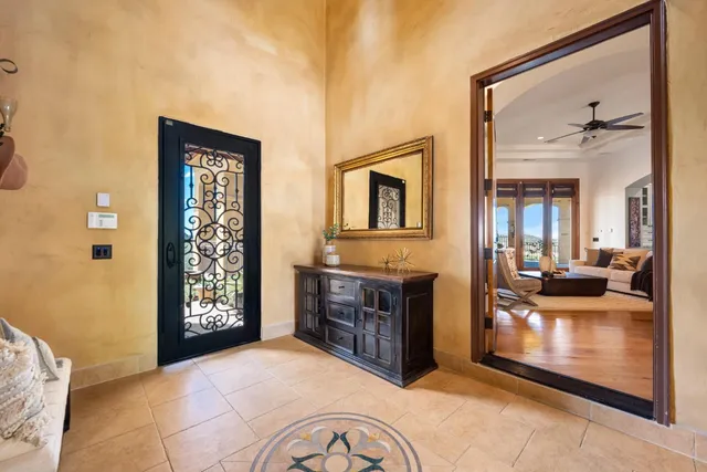 a spacious bathroom with a double vanity sink and a bathtub