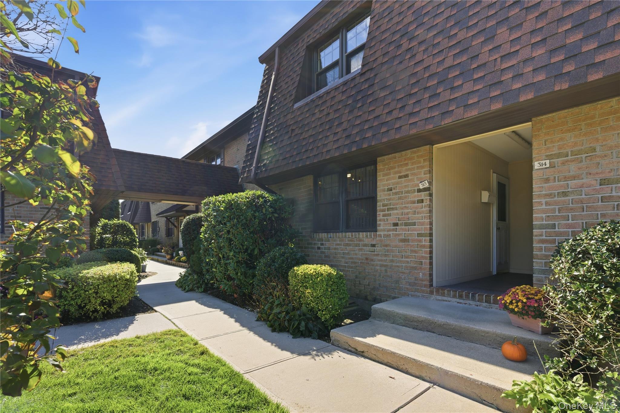 313 Mariners Way Copiague, NY 11726 - Photo 1 of 25 a view of a entrance of the house