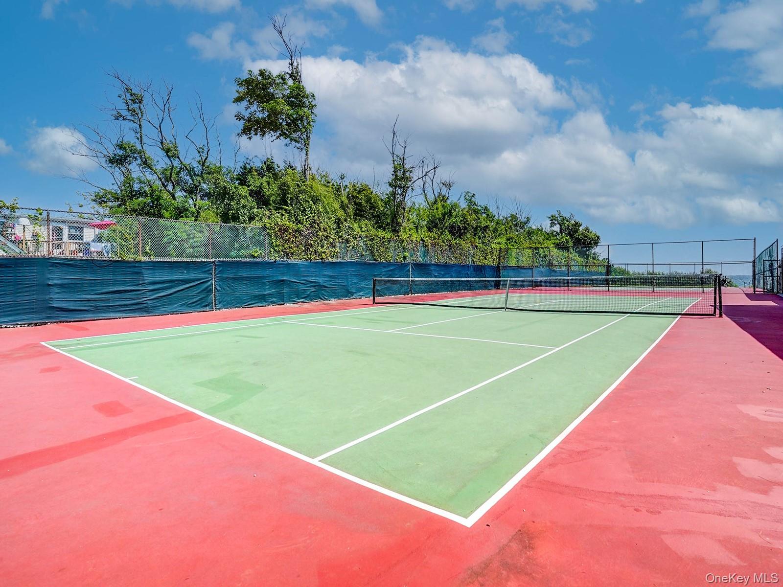 313 Mariners Way Copiague, NY 11726 - Photo 24 of 25 a view of a tennis court