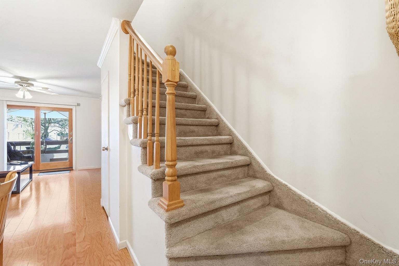 313 Mariners Way Copiague, NY 11726 - Photo 8 of 25 a view of entryway and hall with wooden floor