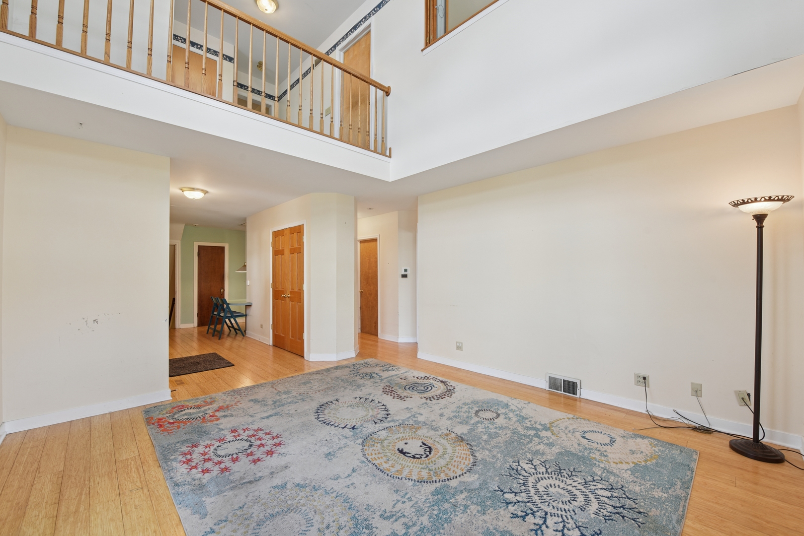 240 North Willow Road Elmhurst, IL 60126 - Photo 13 of 45 a view of a hallway view with staircase and kitchen view
