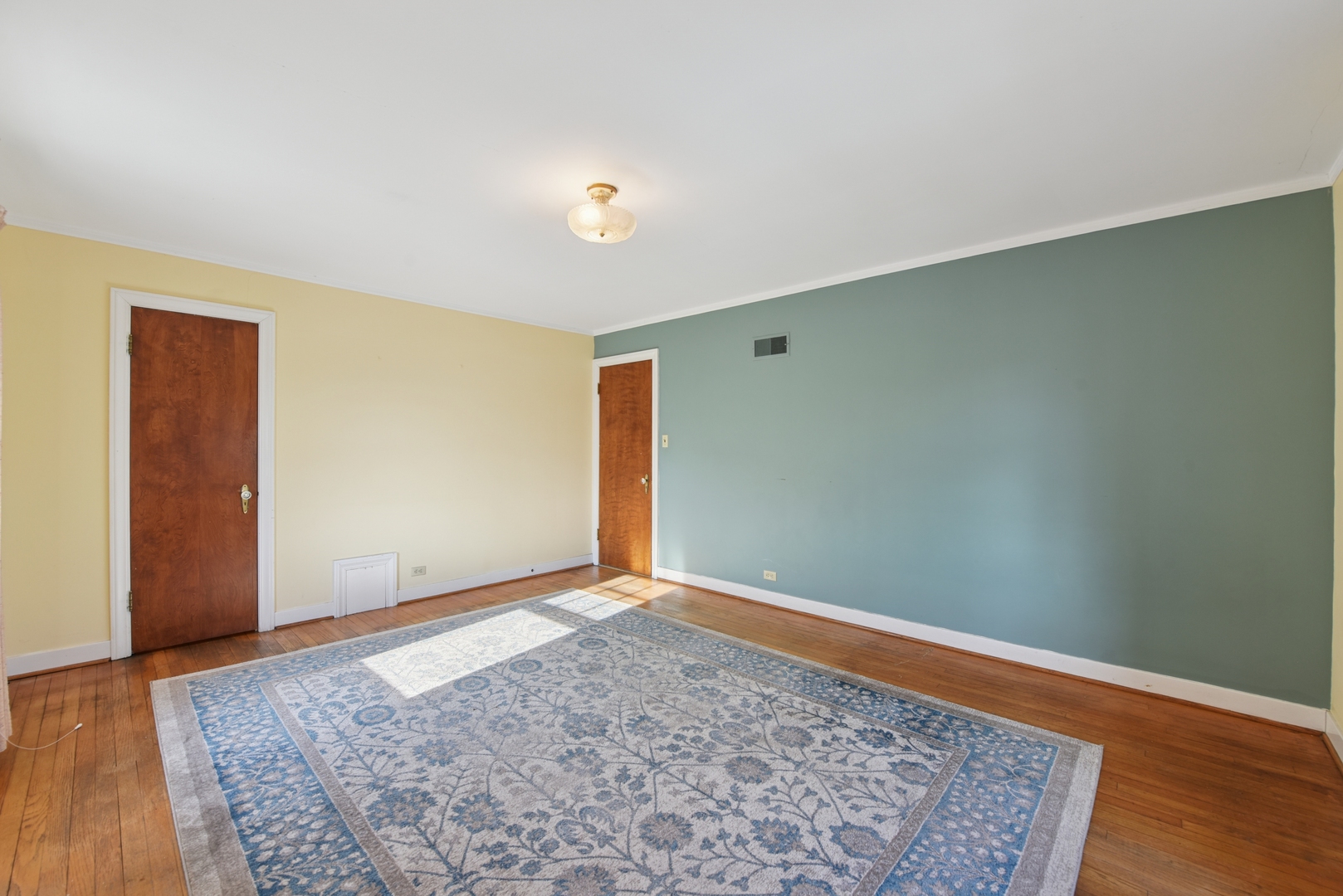 240 North Willow Road Elmhurst, IL 60126 - Photo 25 of 45 an empty room with wooden floor and closet