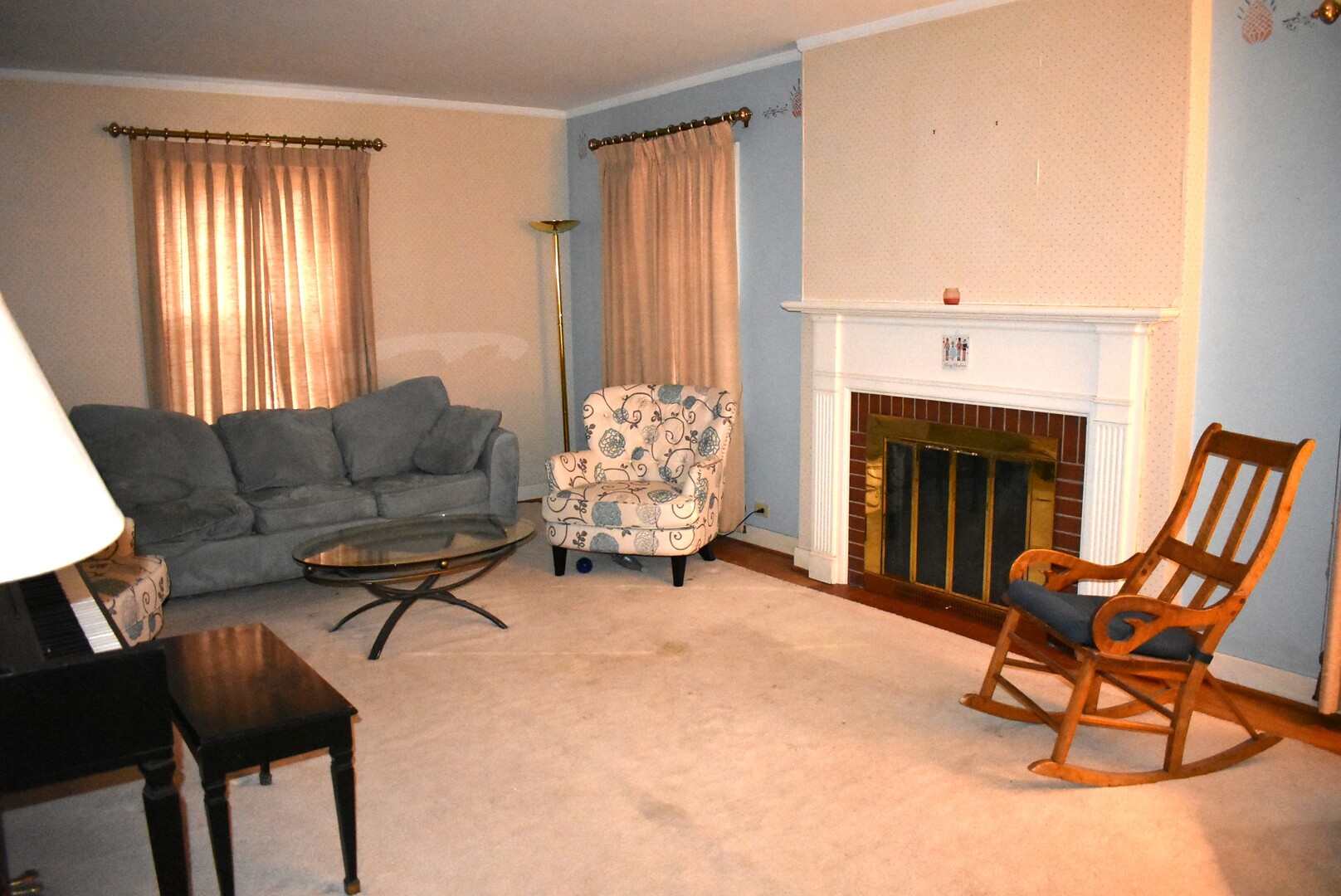 240 North Willow Road Elmhurst, IL 60126 - Photo 3 of 21 a living room with furniture and a fireplace