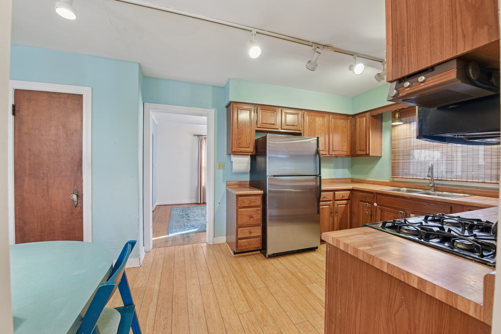 240 North Willow Road Elmhurst, IL 60126 - Photo 9 of 45 a kitchen with stainless steel appliances granite countertop a refrigerator and a stove