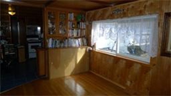 93 Better Way Springfield, MA 01119 - Photo 7 of 25 a view of water heater room with wooden floor