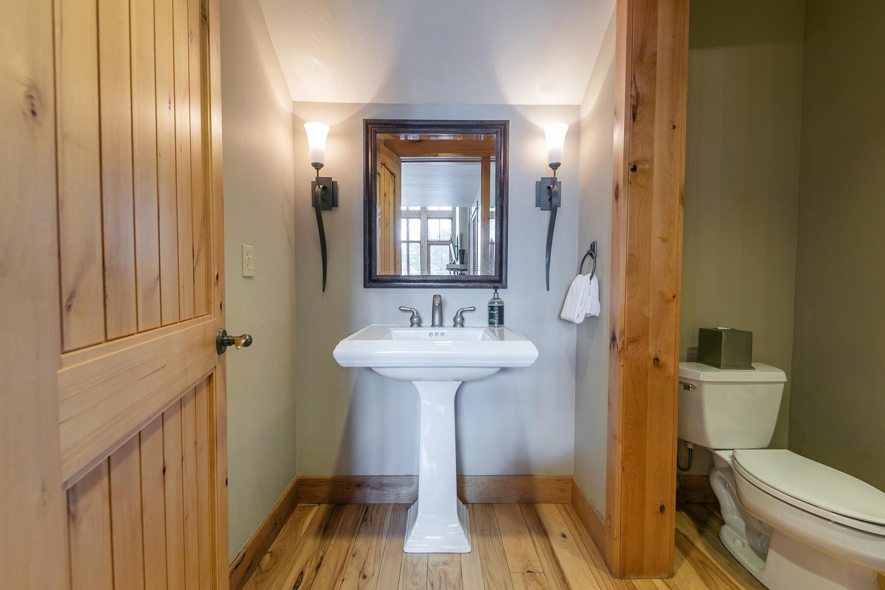 12428 Trappers Trail, Unit F3107 Truckee, CA 96161 - Photo 13 of 28 a bathroom with a sink toilet and mirror